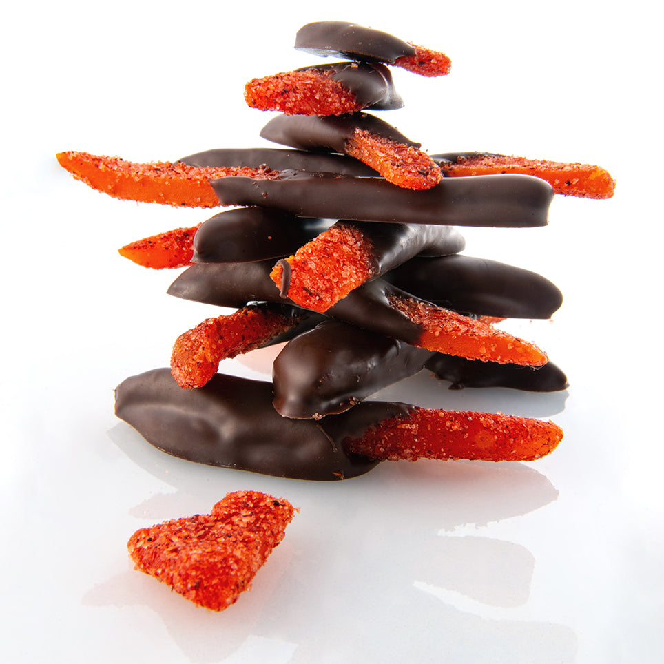 Mango enchilado cubierto de chocolate mil razones y una más