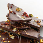 Chocolate Artesanal - Bark con pistache y arándano